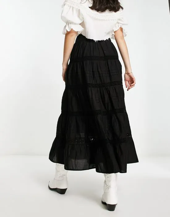 https://images.styletyx.com/images/cotton-lace-insert-tiered-maxi-skirt-in-black-miss-selfridge-869948107_2.webp