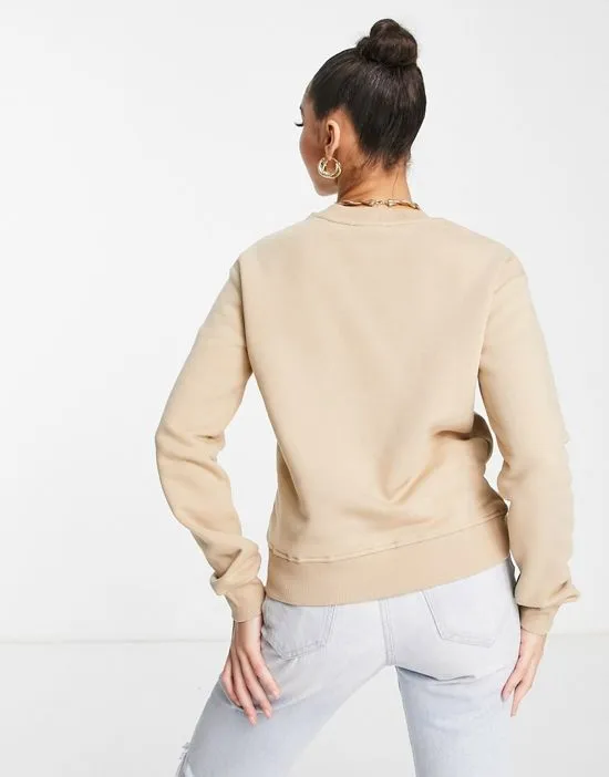 https://images.styletyx.com/images/cotton-logo-print-sweatshirt-in-beige-beige-na-kd-1788733_3.webp