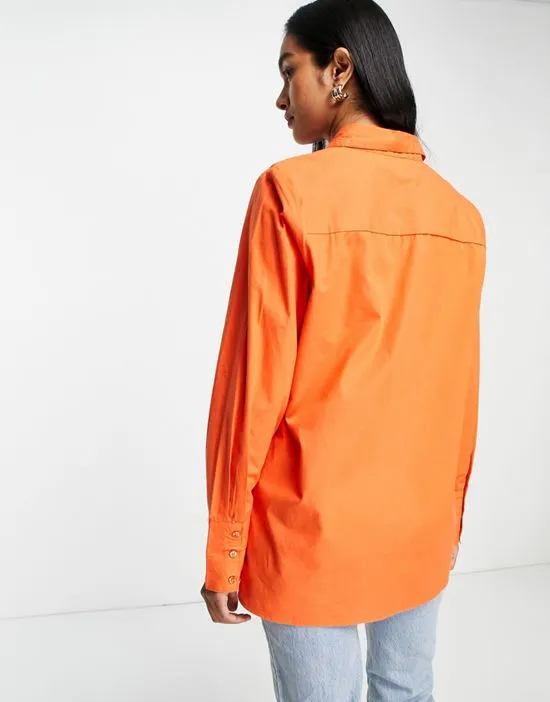 https://images.styletyx.com/images/cotton-oversized-shirt-in-orange-extro-vert-2487574_4.webp