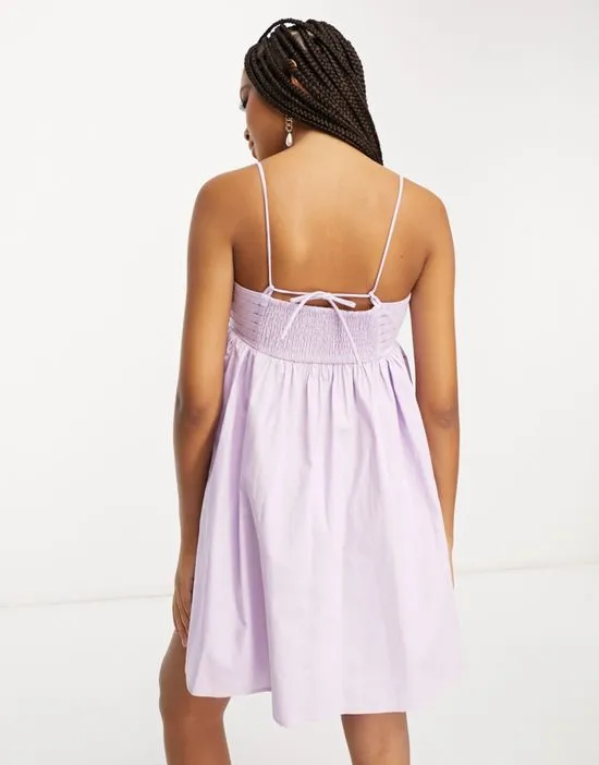 https://images.styletyx.com/images/cotton-pleat-bust-babydoll-mini-sundress-in-lilac-asos-design-13337635_2.webp