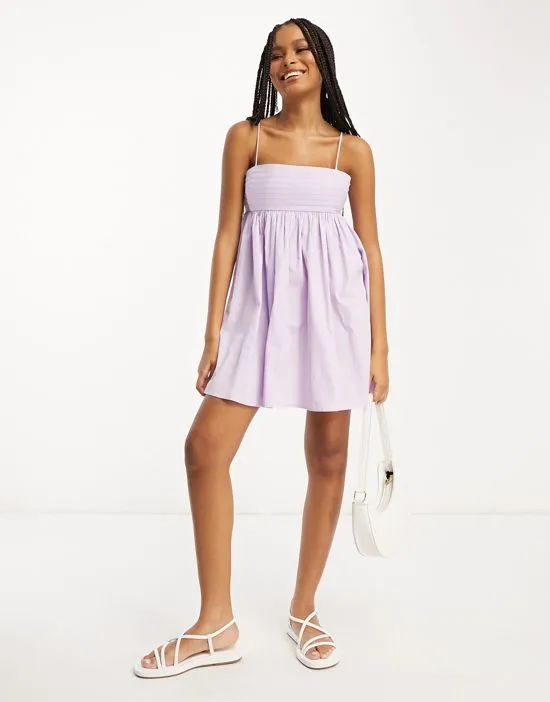https://images.styletyx.com/images/cotton-pleat-bust-babydoll-mini-sundress-in-lilac-asos-design-13337635_3.webp
