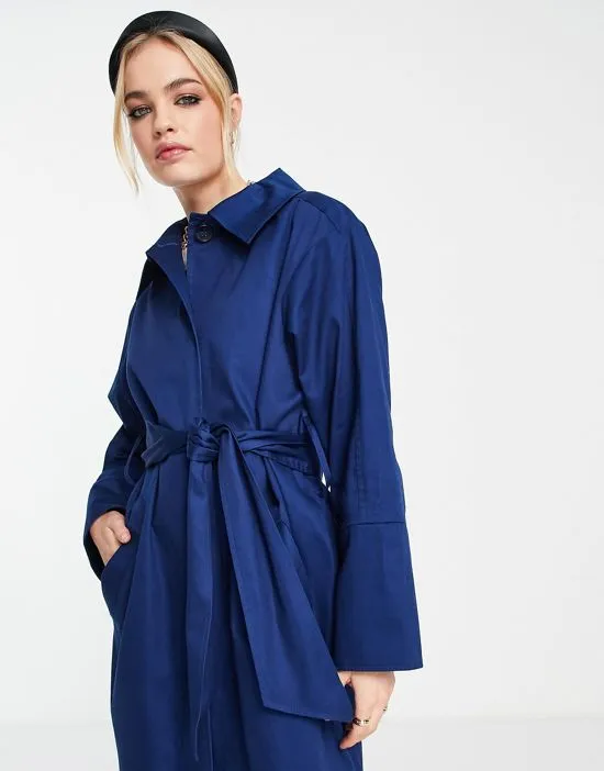 https://images.styletyx.com/images/cotton-trench-coat-with-buttons-in-blue-topshop-2194045_3.webp