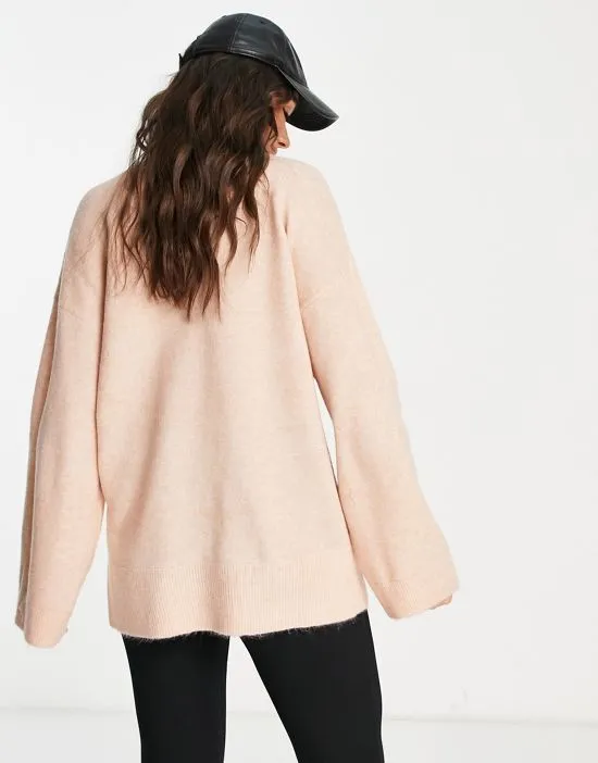 https://images.styletyx.com/images/cozy-deep-v-sweater-in-pale-blush-m-lounge-2397843_2.webp