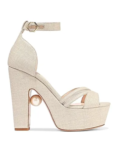 https://images.styletyx.com/images/cream-canvas-sandals-nicholas-kirkwood-13377027_1.webp