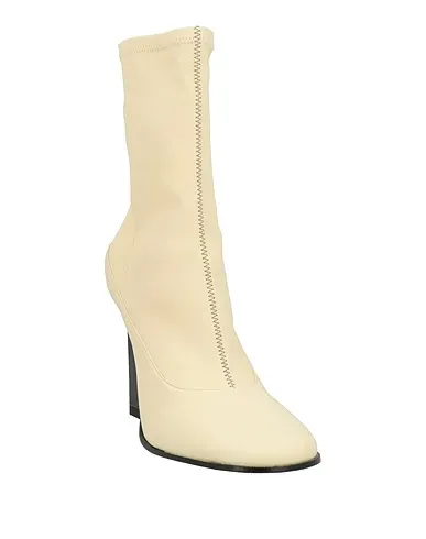 https://images.styletyx.com/images/cream-leather-ankle-boot-wandler-494990838_2.webp