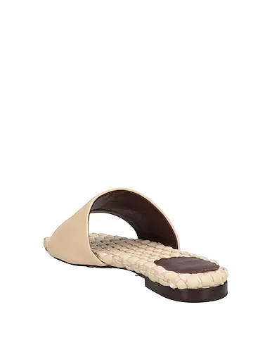 https://images.styletyx.com/images/cream-leather-sandals-hazy-13316721_3.webp