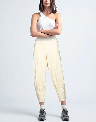 https://images.styletyx.com/images/cream-plain-weave-casual-pants-tadaski-873563530_2.webp