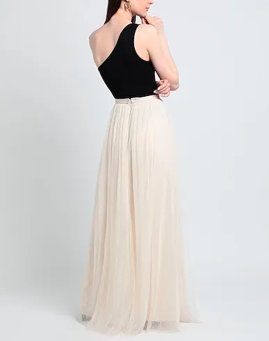 https://images.styletyx.com/images/cream-tulle-maxi-skirts-needle-thread-13391789_3.webp