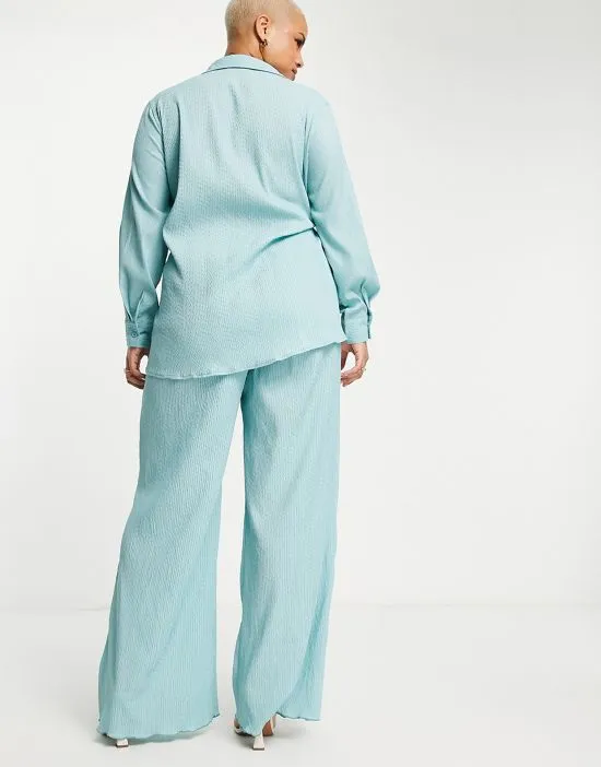 https://images.styletyx.com/images/crinkle-wide-leg-pants-in-blue-part-of-a-set-missguided-plus-2093324_2.webp