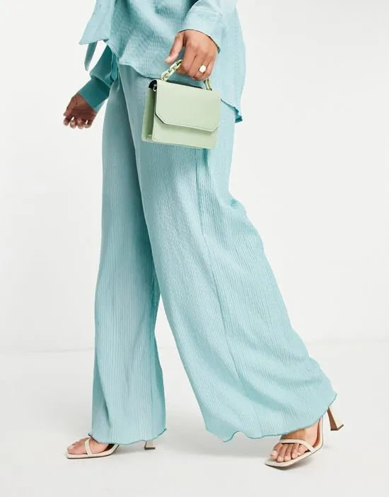 https://images.styletyx.com/images/crinkle-wide-leg-pants-in-blue-part-of-a-set-missguided-plus-2093324_4.webp