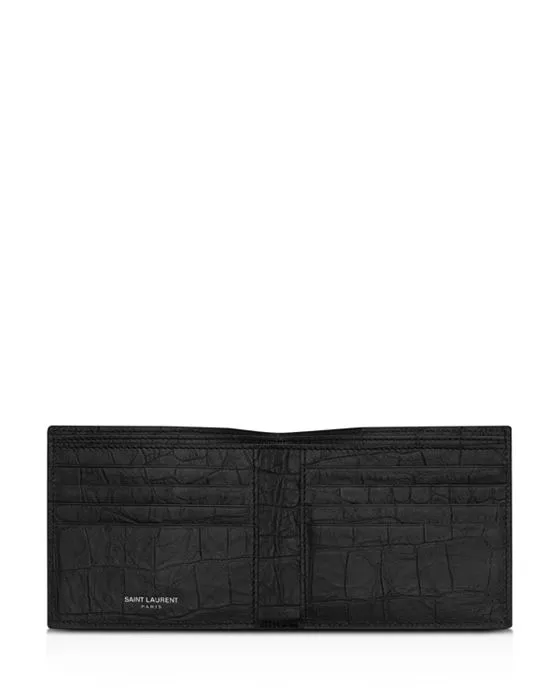 https://images.styletyx.com/images/croc-embossed-monogram-bi-fold-wallet-saint-laurent-2216386_2.webp