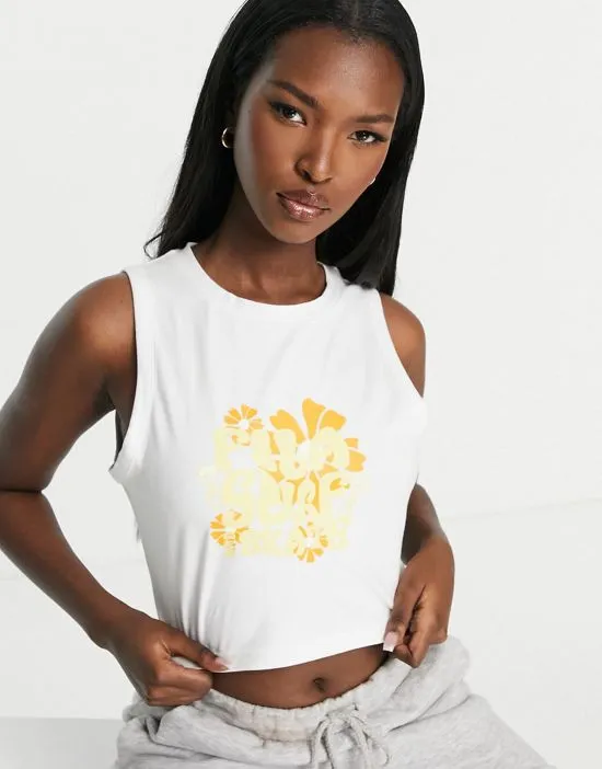 https://images.styletyx.com/images/crop-top-with-60s-print-in-white-and-yellow-fila-2531130_3.webp