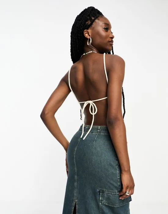 https://images.styletyx.com/images/cropped-backless-crochet-top-in-white-noisy-may-1178778069_3.webp