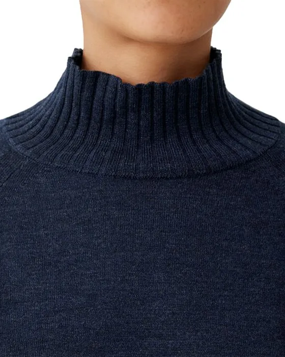 https://images.styletyx.com/images/cropped-wool-turtleneck-sweater-eileen-fisher-1906359082_4.webp