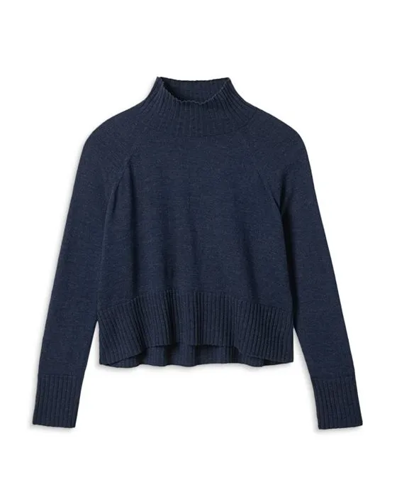 https://images.styletyx.com/images/cropped-wool-turtleneck-sweater-eileen-fisher-1906359082_5.webp