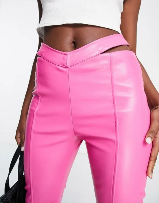 https://images.styletyx.com/images/cut-out-waist-leather-look-pants-in-pink-the-couture-club-2030186_3.webp