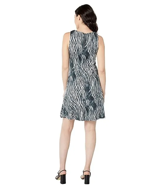 https://images.styletyx.com/images/darcy-zesty-zebra-flounce-dress-tommy-bahama-3087892_2.webp