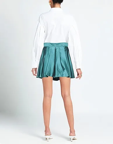 https://images.styletyx.com/images/deep-jade-satin-mini-skirt-feminista-3225599_3.webp
