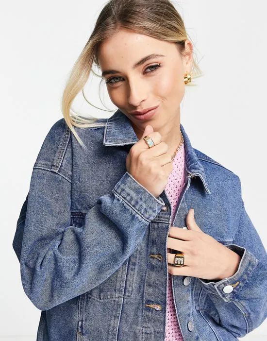https://images.styletyx.com/images/denim-jacket-in-mid-blue-monki-2806094_3.webp