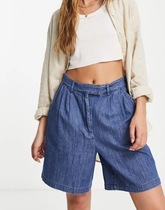 https://images.styletyx.com/images/denim-longline-city-shorts-in-blue-pieces-1866124_1.webp