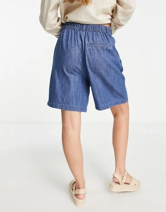 https://images.styletyx.com/images/denim-longline-city-shorts-in-blue-pieces-1866124_2.webp