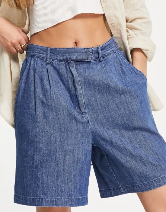 https://images.styletyx.com/images/denim-longline-city-shorts-in-blue-pieces-1866124_3.webp