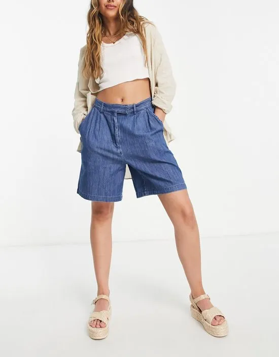 https://images.styletyx.com/images/denim-longline-city-shorts-in-blue-pieces-1866124_4.webp
