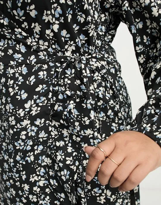 https://images.styletyx.com/images/ditsy-floral-wrap-detail-midi-dress-in-black-wednesday-s-girl-curve-13093897_3.webp