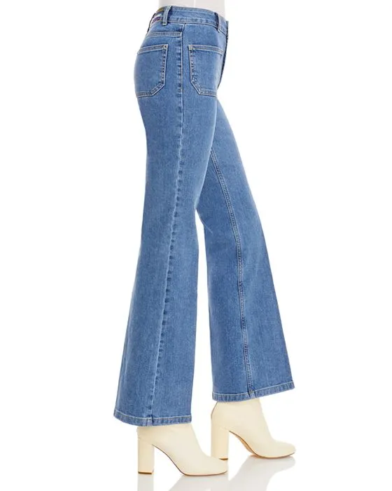 https://images.styletyx.com/images/dompay-flare-jeans-in-blue-vanessa-bruno-1837568_3.webp