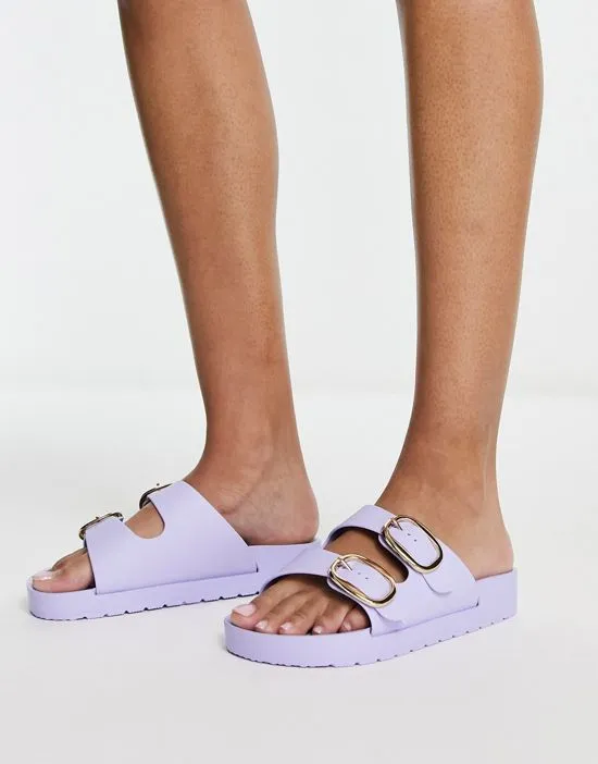 https://images.styletyx.com/images/double-buckle-footbed-sandals-in-lilac-london-rebel-13252925_4.webp