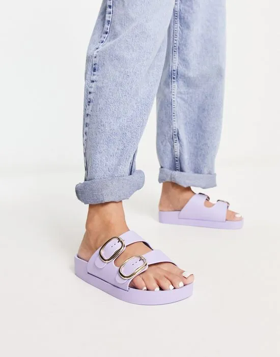 https://images.styletyx.com/images/double-buckle-footbed-sandals-in-lilac-london-rebel-wide-fit-13315875_4.webp