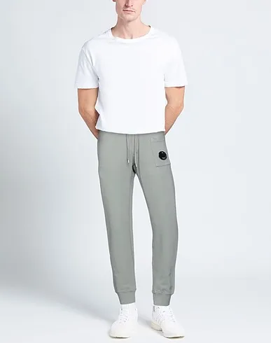 https://images.styletyx.com/images/dove-grey-sweatshirt-casual-pants-c-p-company-13586869_2.webp