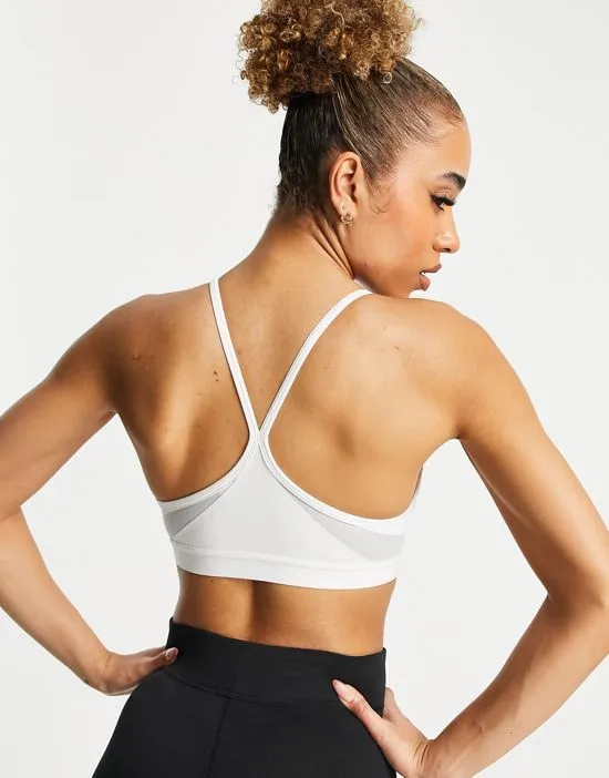 https://images.styletyx.com/images/dri-fit-indy-v-neck-light-support-padded-sports-bra-in-white-nike-2033499_3.webp