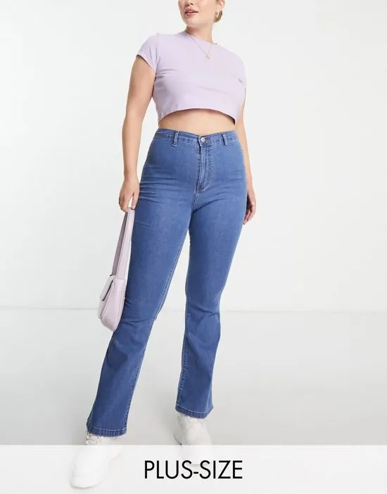 https://images.styletyx.com/images/dtt-plus-bianca-high-waisted-flare-disco-jeans-in-mid-blue-don-t-think-twice-plus-1964848_1.webp