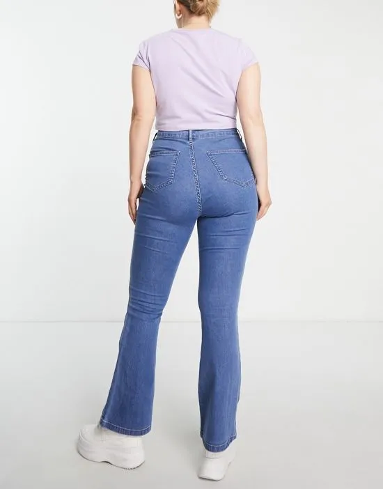https://images.styletyx.com/images/dtt-plus-bianca-high-waisted-flare-disco-jeans-in-mid-blue-don-t-think-twice-plus-1964848_2.webp
