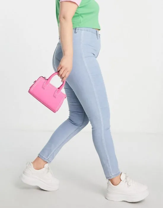 https://images.styletyx.com/images/dtt-plus-chloe-high-waist-disco-stretch-skinny-jeans-in-light-wash-blue-don-t-think-twice-plus-1951273_3.webp