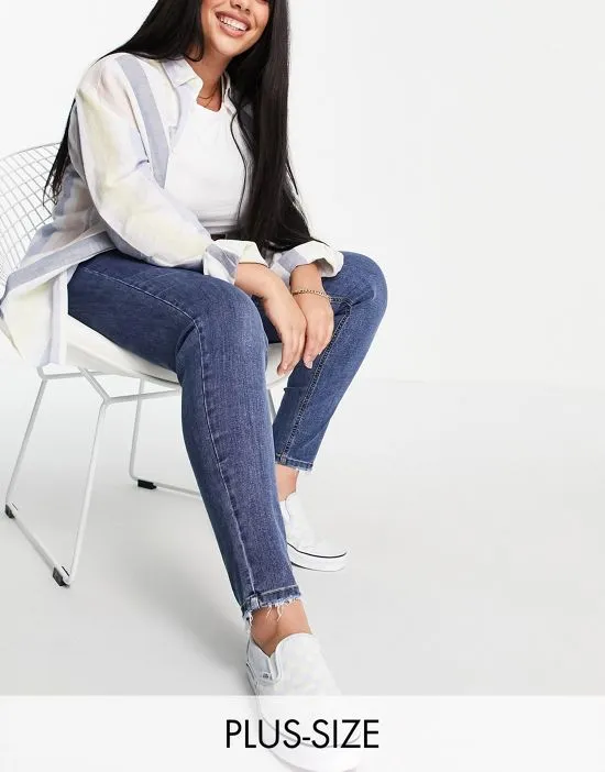 https://images.styletyx.com/images/dtt-plus-ellie-high-waisted-skinny-jeans-in-mid-blue-don-t-think-twice-plus-1938132_1.webp