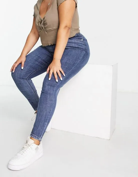 https://images.styletyx.com/images/dtt-plus-ellie-high-waisted-skinny-jeans-in-mid-blue-don-t-think-twice-plus-1965245_1.webp