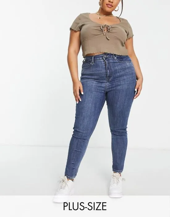 https://images.styletyx.com/images/dtt-plus-ellie-high-waisted-skinny-jeans-in-mid-blue-don-t-think-twice-plus-1965245_2.webp