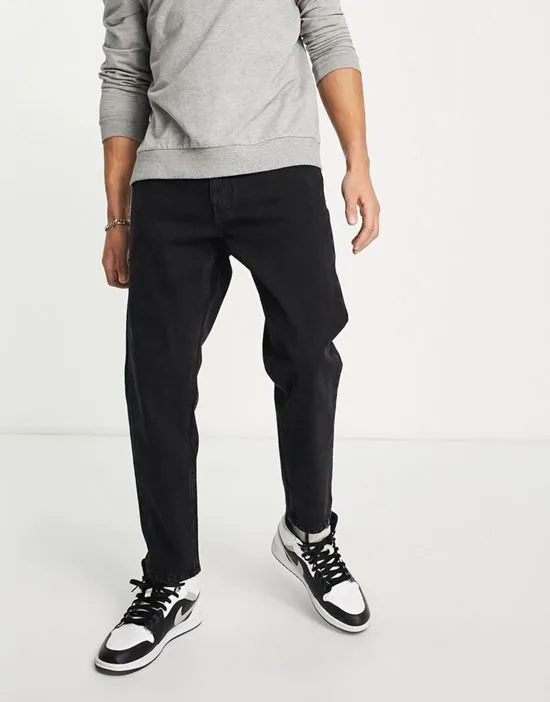https://images.styletyx.com/images/dtt-rigid-tapered-fit-jeans-in-washed-black-don-t-think-twice-2616963_3.webp