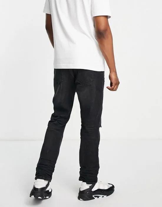 https://images.styletyx.com/images/dtt-slim-fit-extreme-rip-jeans-in-washed-black-don-t-think-twice-2659733_2.webp