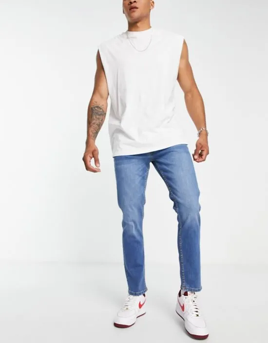 https://images.styletyx.com/images/dtt-slim-fit-jeans-in-mid-blue-don-t-think-twice-13521785_2.webp