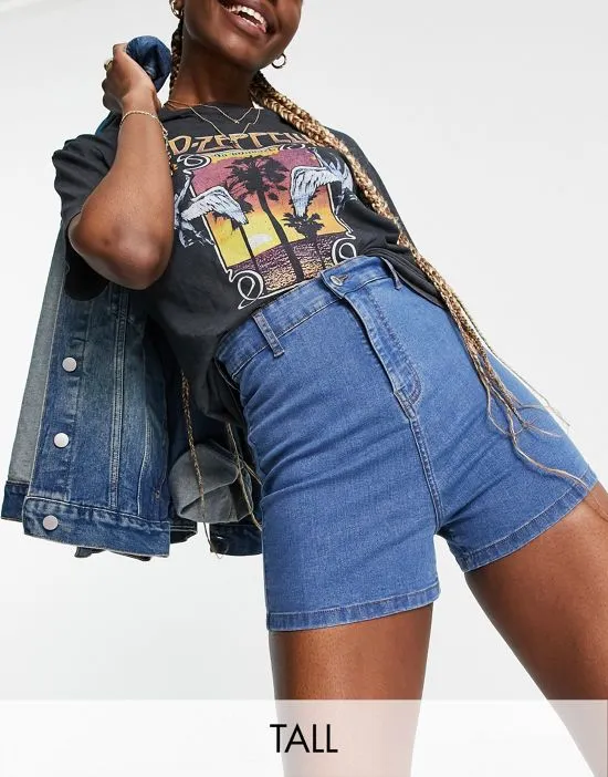 https://images.styletyx.com/images/dtt-tall-charlotte-high-waisted-disco-denim-shorts-in-mid-blue-don-t-think-twice-tall-2802257_1.webp