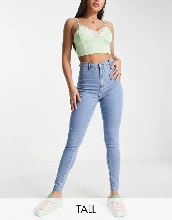 https://images.styletyx.com/images/dtt-tall-chloe-high-waisted-disco-stretch-skinny-jeans-in-light-wash-blue-don-t-think-twice-tall-1924284_1.webp