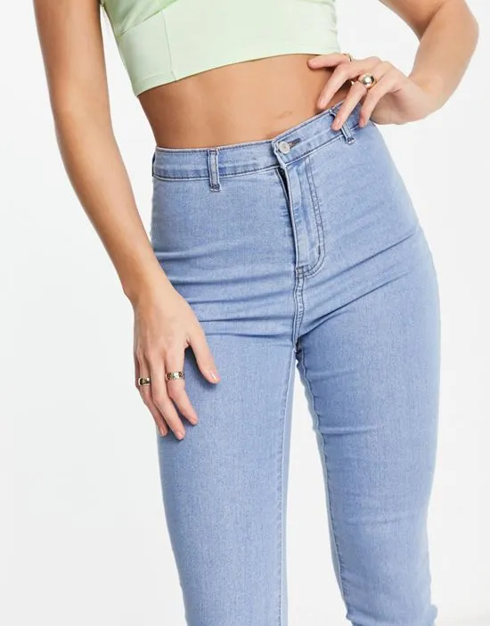 https://images.styletyx.com/images/dtt-tall-chloe-high-waisted-disco-stretch-skinny-jeans-in-light-wash-blue-don-t-think-twice-tall-1924284_3.webp