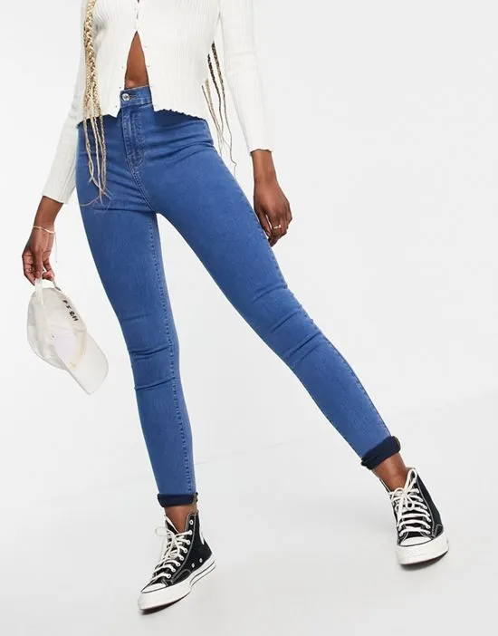 https://images.styletyx.com/images/dtt-tall-chloe-high-waisted-disco-stretch-skinny-jeans-in-mid-wash-blue-don-t-think-twice-tall-1926381_4.webp