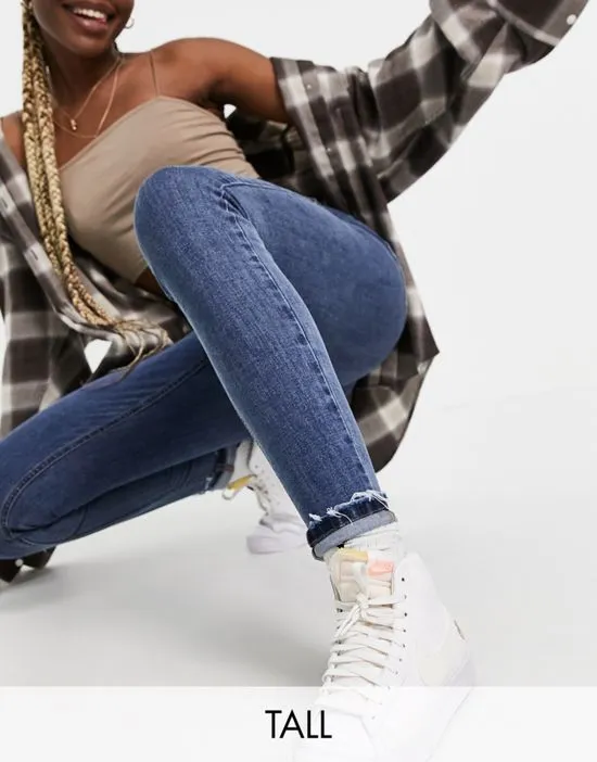 https://images.styletyx.com/images/dtt-tall-ellie-high-waisted-skinny-jeans-in-mid-blue-don-t-think-twice-tall-1921970_1.webp