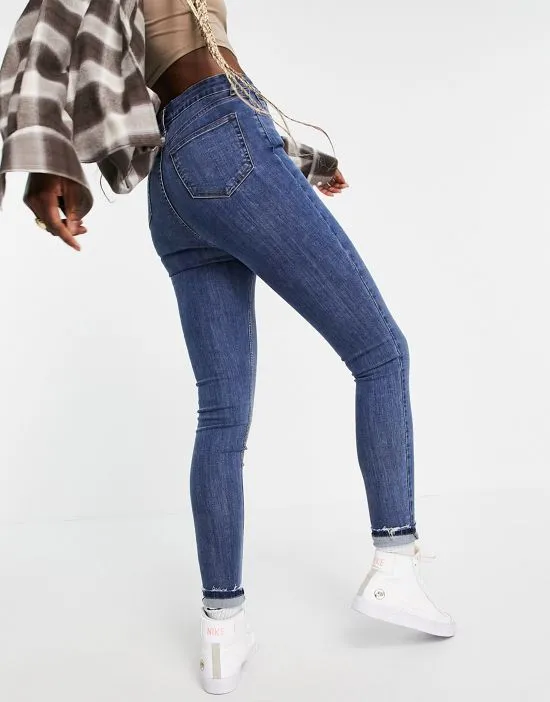 https://images.styletyx.com/images/dtt-tall-ellie-high-waisted-skinny-jeans-in-mid-blue-don-t-think-twice-tall-1921970_2.webp