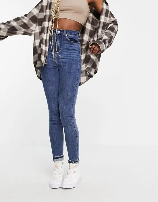 https://images.styletyx.com/images/dtt-tall-ellie-high-waisted-skinny-jeans-in-mid-blue-don-t-think-twice-tall-1921970_4.webp