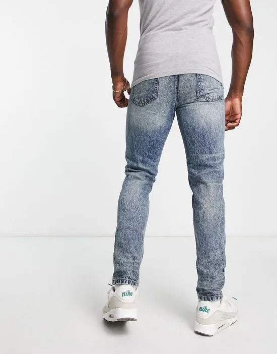 https://images.styletyx.com/images/dtt-tall-rigid-tapered-fit-ripped-jeans-in-vintage-dark-blue-don-t-think-twice-2659731_2.webp